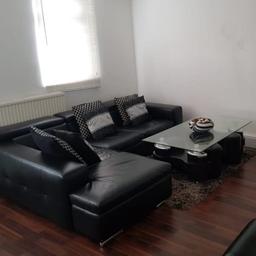Dwell L Shape sofa in black,  as you can see at the pictures the leather is ripped in one side and few whole on few place.  I paid £1699 for this sofa  and I'm sure the leather can be replaced for small fee. 
collection only