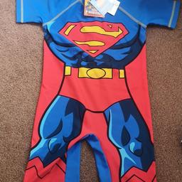 BNWT,.
SUPERMAN swim suit
 and swim bag superman
age 4_5