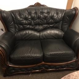 Leather sofa is very good condition, some scratches on the wooden part when we moved but it can easily be painted over with varnish. If u would like to come view it that’s no problem. I am in e14 area. Iv also included pictures of what it looks under the cushions, my crazy kids spilt drink.