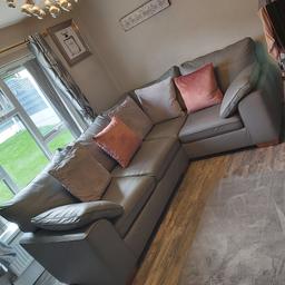 beautiful corner sofa Italian grey leather very big sofa had 3years and still got a life time in it just going to a smaller sofa little wear on on arm but can see up close only no silly offers plz no time wasters pick up only welcome to view cushion not included bought from marks and Spencer for £ 3000