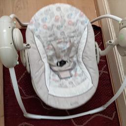 unisex baby swing chair can be used from newborn, automatically swings and plays a tune, strap to keep baby secure. folds for storage.