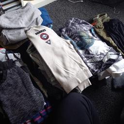 mixture of boys clothes from age 4 to 8, including trousers, tops, jumpers, knitted jumpers, pjs, shorts 40 items in total