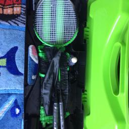 Cool hard case, with all you need for a game of badminton.