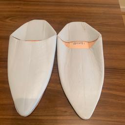 Here for sale is a pair of new men’s Moroccan slippers, in pale blue, it says size 43. But they are too small. I’d say they will fit a men’s U.K. 7/8 at least.
Grab a bargain. Sensible offers considered