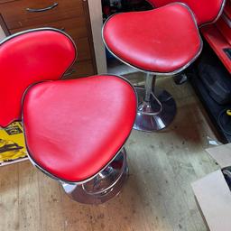 2 red bar stools