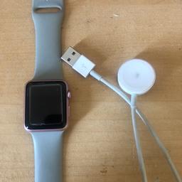 Apple watch series one (crack on screen)  and charger works fine.