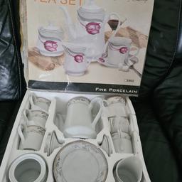 17 pieces tea set in a box never used. collection only in chadwell heath