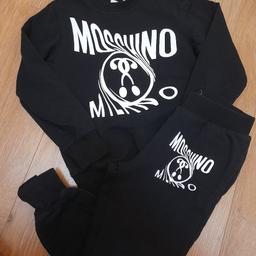 Boys moschino tracksuit age 4 
Great condition 
very minimal fading to cover myself 
price includes postage 
£45