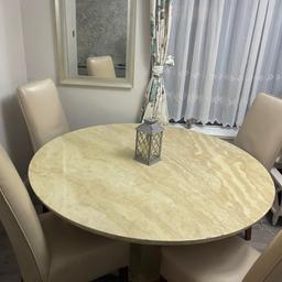Beautiful marble cream heavy marble table only few chips hardly noticeable 4 cream real leather chairs no rips very good condition as seen in pictures I want it gone open to offers no silly prices and time wasters 