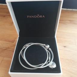3 genuine bracelets with box
16cm
1 bangle with traditional 'pandora' clasp
1 bangle with decorative clasp
1 bracelet with lock clasp
Selling cheap for quick sale - £50 for all 3