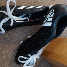 Adidas Football Boots size 9.5UK (adult size)
Only used for 1 Term for PE 
Bargain price