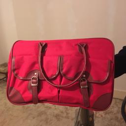 Matching pair red bag and hold-all