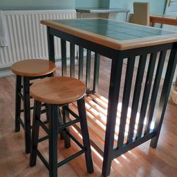 Lovely wood and green breakfast bar. 2 stools which fit completely under. Table: H 88cm, D 59cm, L 89cm. Stools H 60cm.
COLLECTION ONLY FROM SOLIHULL AREA.