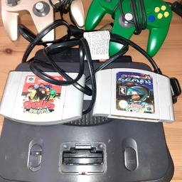 Nintendo 64 with 2 games and 2 controls wire in the back not got but all working