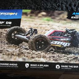 remote control buggy with two batteries and charger very fast