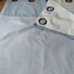 Selling a pair of dunelm eyelet lined curtains +matching cushion cover,wedge wood blue colour and white narrow stripe with thin lace detailing, 66x (drop) x54( wide).
Excellent clean condition, this range is still available to buy from dunelm.
comes from a smoke free home.