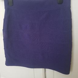 Elasticated, womens/ladies/girls purple mini skirt

From smoke and pet free home
Please see my other items as well