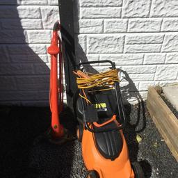 Lawnmower and strummer set in good working order, selling because I no longer have a lawned area