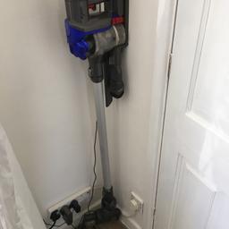 Dyson cordless vacuum with wall mount and charger
