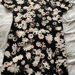 Lovely floral size 14 dress, concealed side zip. New and left hanging in cupboard