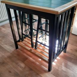 Lovely breakfast bar and 2 stools that store under table. Green ceramic tile top, green and wood coloured legs. Table H: 87cm D: 59cm L:90cm, stools H:60cm.
**COLLECTION ONLY FROM SOLIHULL AREA** Re advertised due to potential buyer not making contact.