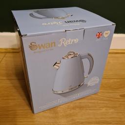 Brand new in box Swan retro style Blue Kettle. never been used.