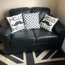 Black faux leather 2 seater sofa & Pouffe only used in study