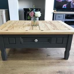 A lovely large rustic coffee table. Colour :meridian grey with a natural wooden top. It has a lovely small drawer in the front