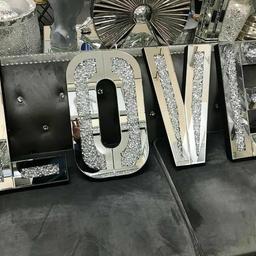 We are totally in LOVE with the Manhattan Mirrored Crushed Diamond LOVE Letters and we think they will make the perfect gift.

They look dazzling wall hung and will be an impressive addition to your home. Or, why not treat someone you LOVE to a set of our stunning Manhattan Diamond LOVE Letters, they would be a perfect gift for newlyweds or as an Anniversary gift or just a way of saying "I LOVE YOU" to that special person in your life.

Product Details

Approximate Dimensions of Each Letter: Height 50 cm x Width 30 cm x Depth 1.5 cm
Inlaid with Crushed Diamonds
Wall Mountable
Bevelled Mirror
Hooks for wall mounting to back of each letter