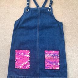 New from George girls denim pinafore with sequin patch pockets

Age 7/8