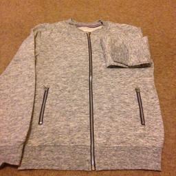 Worn once, collarless grey marl jacket with zip pockets in size small. From smoke free home, collection Flixton area or can post for additional charge. Thanks for looking 😊