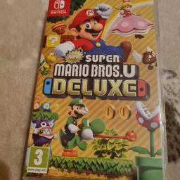 nintendo switch game. super mario deluxe. in as new condition. perfect working order. from clean smoke and pet free home