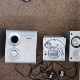 goodmans stereo with bass box....loads of bass fully working condition with all cables and remote with cd and fm/am radio ( pic is upside down..can be seen working