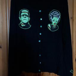 Black frankinstien cardigan by Banned size M/L good condition.  bats on cuff of sleeve.