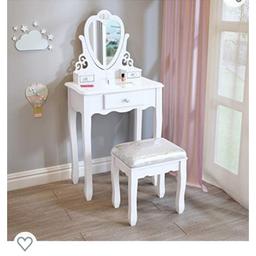 dressing table new in box 70 ...daughter got 2 for for her birthday.. please don't make a offer then asked me to email u had this scam before thank you 