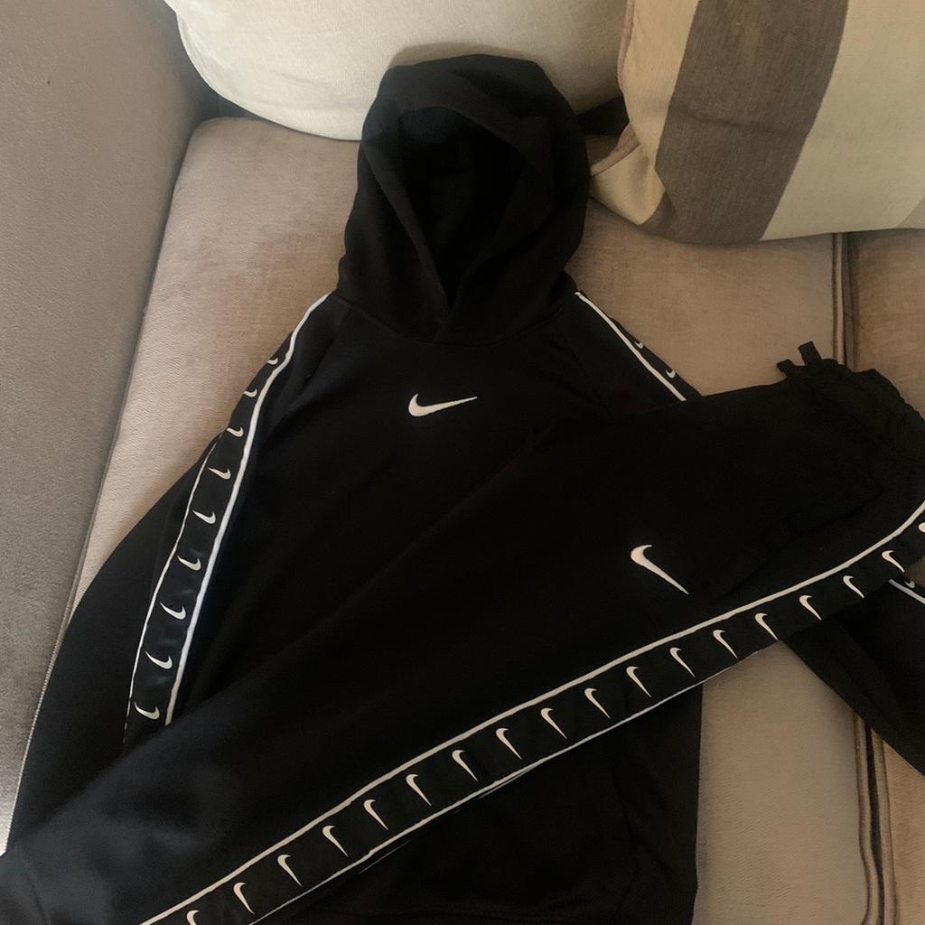 Nike taped hotsell poly tracksuit