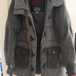 Good condition black and white Super dry Coat. Quite heavy and warm. Front and side pockets zip up and toggle fastening.

collection Brockwell Chesterfield S40 or will post for cost of postage.