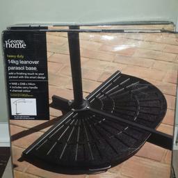brand new garden lean over parasol Base.  give your parasol that nicer finish RRP £30 no use myself have few available . heavy duty 14kg has handle for moving  ..kings Norton b38 collection only due to weight possible delivery if time an fuel coverd.
