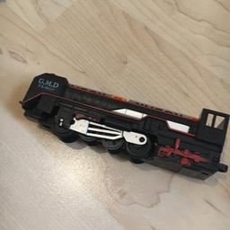 Electric train has a light and has one oil tanker and one EC max and does not include the batteries. Batteries needed are 2 AA batteries It also comes with 15 tracks.This train set is free.