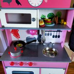 Children's kitchen in excellent condition. Includes extras like play food and pots and pans.