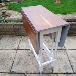A compact and sensitively upcycled/restored table.
I have chalk painted the underside and Danish Oil polished the top.
There are the odd chip/stain which I have left to show it's character (see the photos)
It is a solid and unique table that would fit in either a modern or old fashioned kitchen.

Dimensions are

Fully open is 89cms long and 60.5cms wide
Each side leaf measures 59cms X 60.5cms.
Height is 76cms

Collection only please.

Any questions please ask.