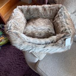 For sale a square pet bed, brand new. Bought for my dog but she won’t go near it, unfortunately can’t take it back as the shop won’t accept it back incase an animal has gone in it. Would be great for cats or a small dog.

Brand new with tags.

Height 24cm
Width 62cm
Depth 53cm.

£15
Collection only from ME5.
Advertised elsewhere.