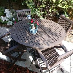 Beautiful Quality Heavy Solid Teak Garden Table and Four Folding Chairs

Comes with Cushions and Parasol Stand

Table is 1.2m diameter

Can deliver locally. Send full postcode for details.

Cash on collection or delivery only