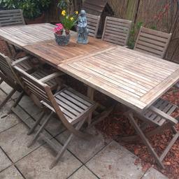 Hard Woodstock Solid Teak Extending Garden Table and 8 Chairs

Table is 2.6m long extended (2m unextended) X 1.2m wide

All chairs fold and includes 2 folding armchairs

Legs are removable.

Can deliver locally. Send Full postcode for details

Cash on collection or delivery only