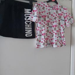 Designer Moschino Girls Top and Skirts 
Age 8
Good Condition