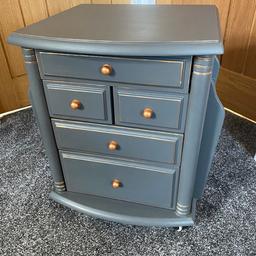 Up cycled magazine table with 5 drawers it has 4 new wheels
