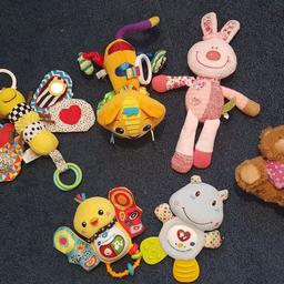 2 vtech animals with noises and music, lamaze cat, 2 rattle plushes and a teddy bear.

in great clean condition and from a smoke free home.