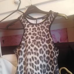 Beautifull dress never worn s5 no posting pick up only size 12