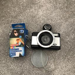 Lomography Fisheye 2 Camera including 2 x 35mm Film

Used like new, great little fisheye camera. Included are 2 x 35mm negative film. 
Collection only preferred
