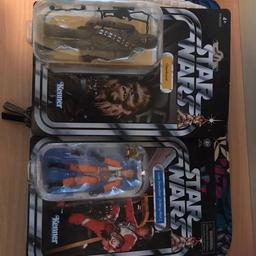 Two star wars figures.